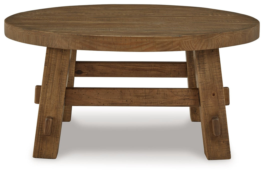 Mackifeld - Round Cocktail Table - Warm Brown