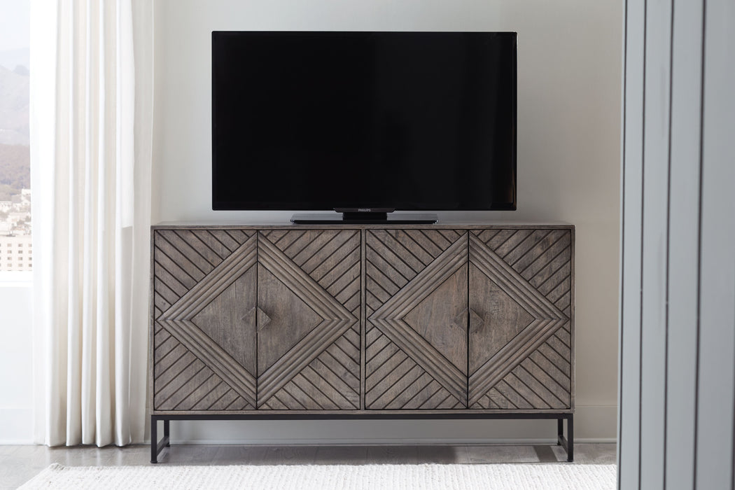 Treybrook Distressed Gray 4 Door Accent Cabinet